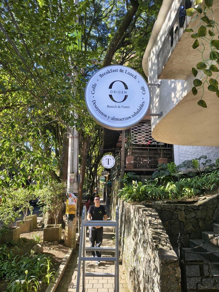 Aviso redondo de Origen Brunch and Pastry